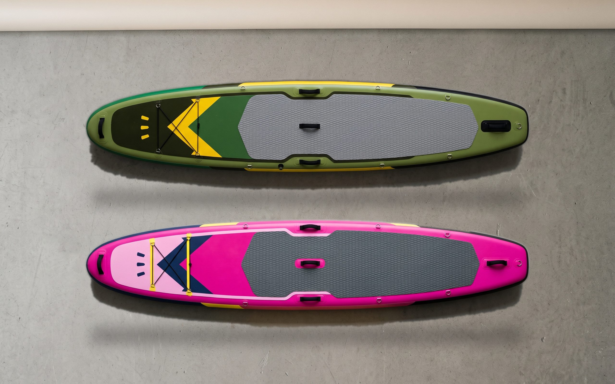 Print deck inflatable paddle board, deck side up on a plain floor.