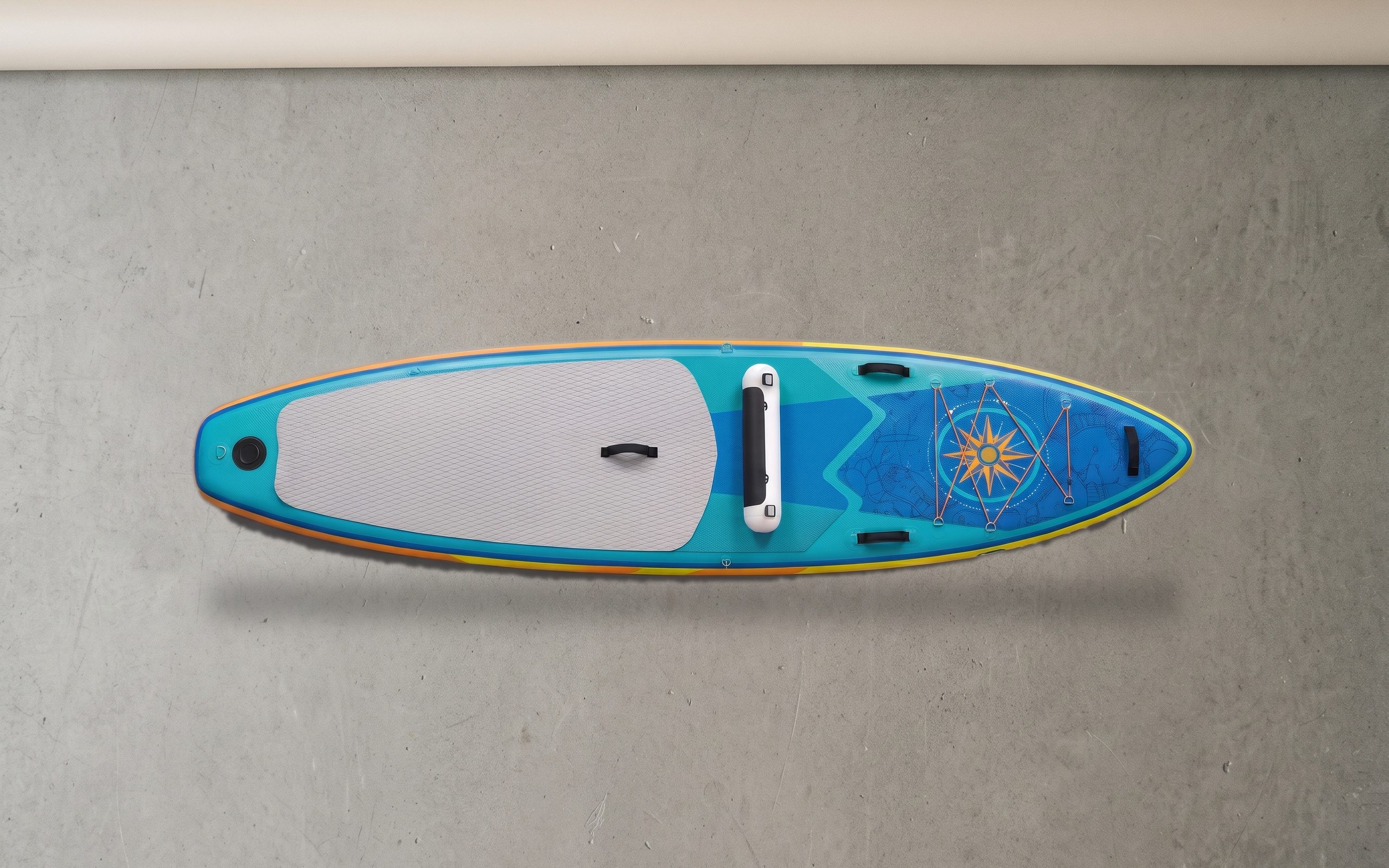All-round inflatable paddle board, deck side up on a plain floor.